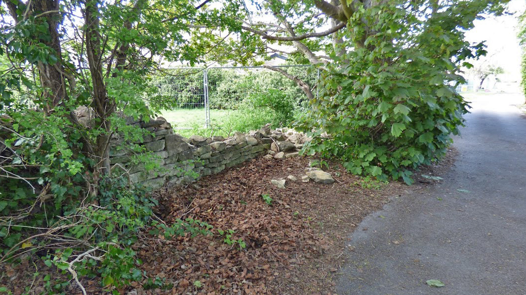 Boundary wall at Backstones Open Space