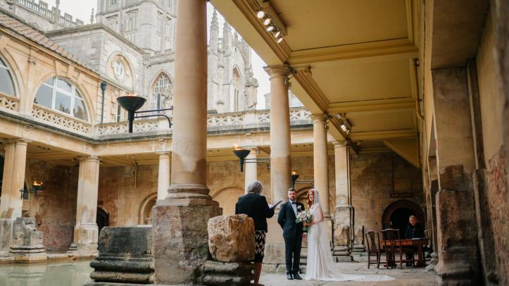 Roman Baths couple getting married by the water