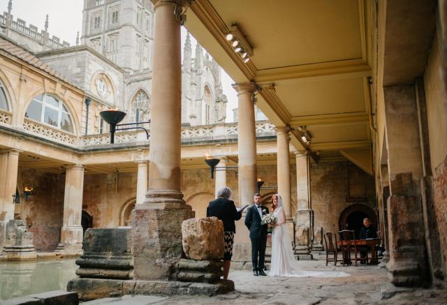 Roman Baths couple getting married by the water