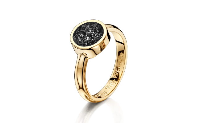 gold and black tribute ring